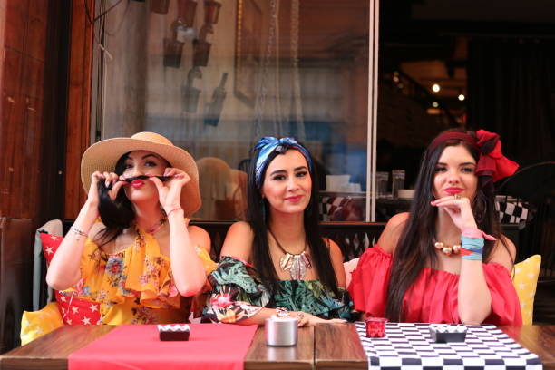 istock three young beautiful women chatting and having fun in cafe 1322322251