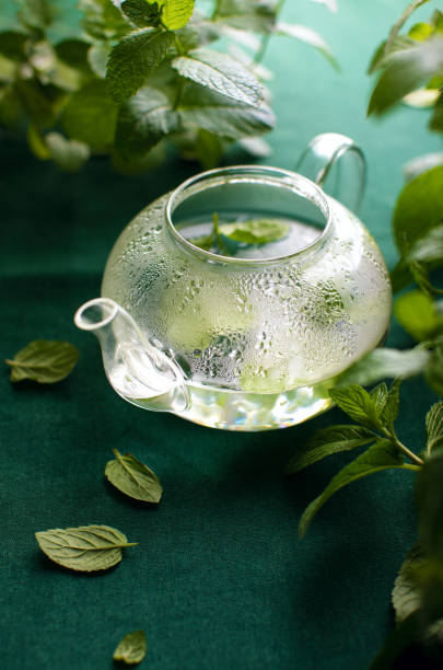istock Freshly brewed mint tea in a glass teapot 1322322630