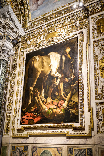 Rome, Italy, May 10 -- The Chapel of the Assumption with the splendid painting of the Conversion of Saint Paul by Caravaggio, a masterpiece of Italian Baroque art, inside the church of Santa Maria del Popolo, in the historic heart of Rome. Built in the Renaissance style and completed in the 16th century in the baroque style, this church is famous for the presence of paintings by Caravaggio and for the Chigi Chapel, with works of art by Raphael and Giovanni Lorenzo Bernini. Image in high definition format.