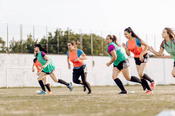 istock Female rugby team in attack 1322327462
