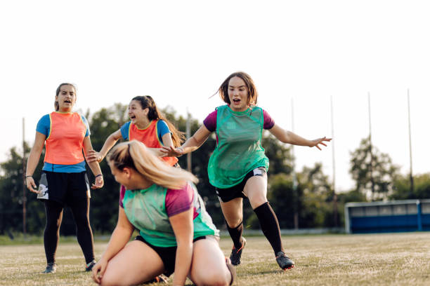 istock Girls playing rugby 1322327469