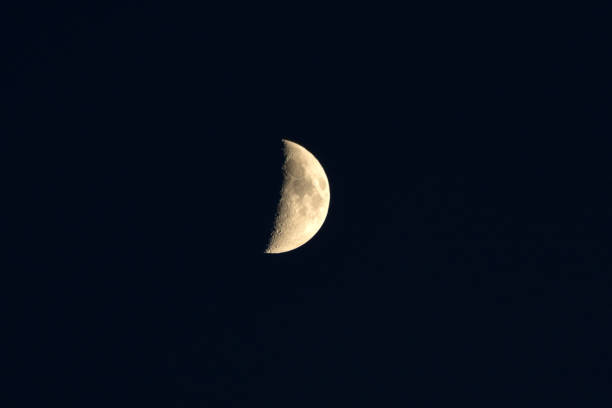 A crescent moon in the evening sky in the northern hemisphere