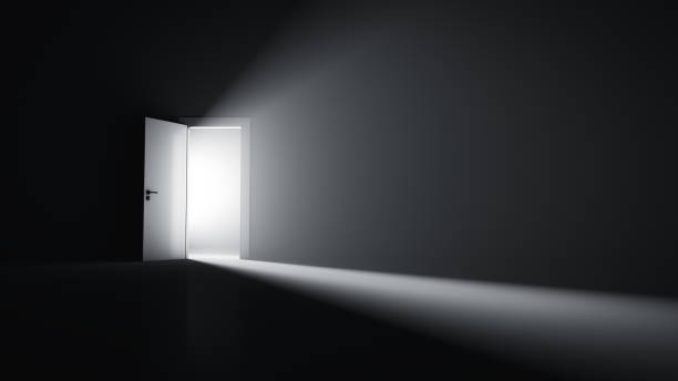 istock Open door to a room with bright light. 1322332966