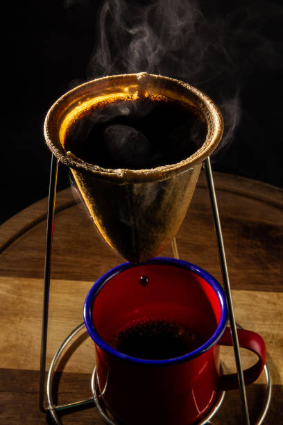istock Coffee being strained in the strainer. 1322334984