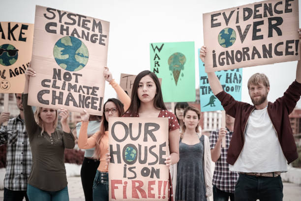 istock People protesting against multicultural opinion. Young people from different countries showing their ideology. Young together under same defense - Image 1322337420