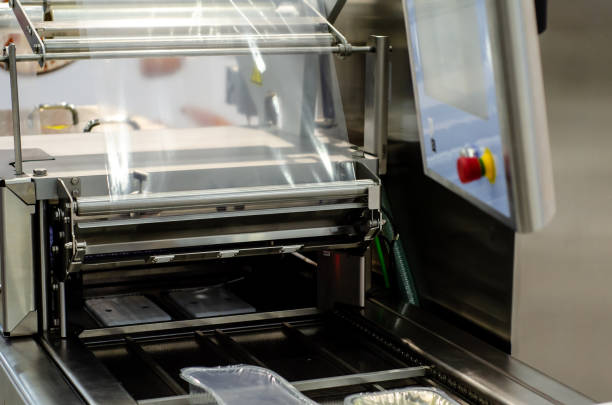 istock Automatic packaging machine for producing packs  from a roll of heat-sealable packaging film 1322337651