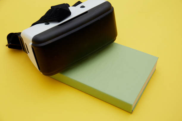istock VR glasses and books on a table symbolizing digital learning. 1322344061