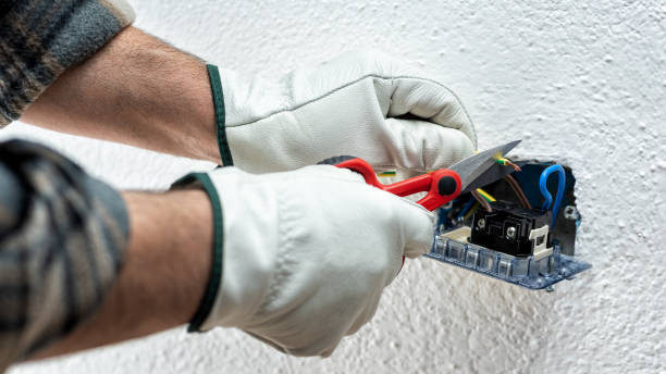 istock Electrician at work on a residential electrical system. Electricity. 1322348455