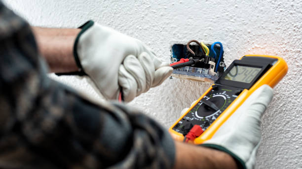 istock Electrician at work on a residential electrical system. Electricity. 1322348456