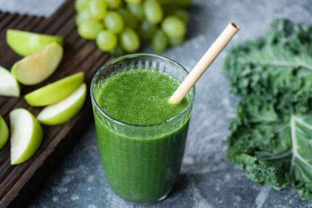 istock Detox green smoothie in glass 1322349251