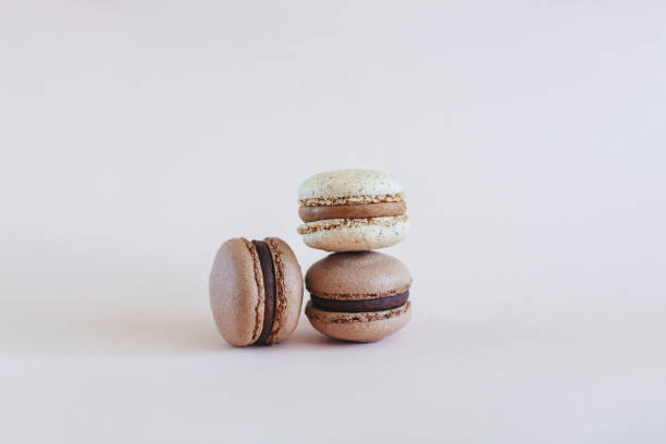 istock Tasty French macarons on a pastel background. 1322351467