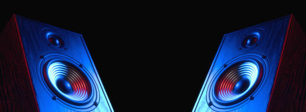 istock Two sound speakers in neon light 1322359060