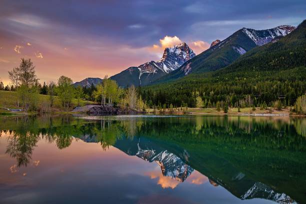 istock Bright Sunrise At Quarry Lake In Canmore 1322361158