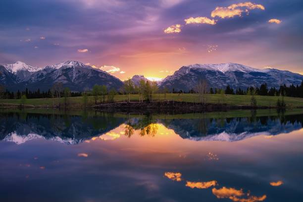 istock Colourful Sunrise Lighting Up A Mountain Park 1322361251