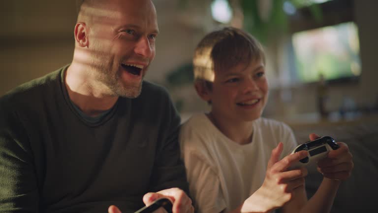 Siblings spending time with father. Having fun while playing