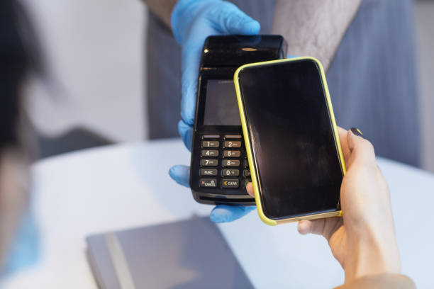 istock Covid Safe Payment Closeup 1322365374