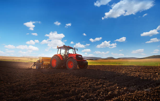 istock Red tractor in the field! 1322366168