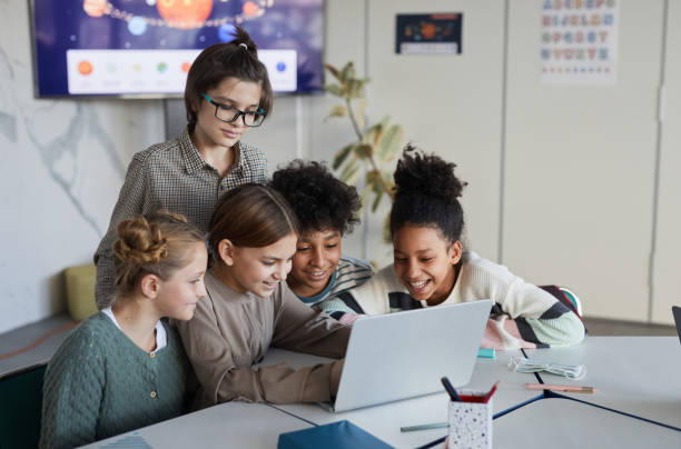 istock Diverse Group of Kids Studying Together at School 1322369778