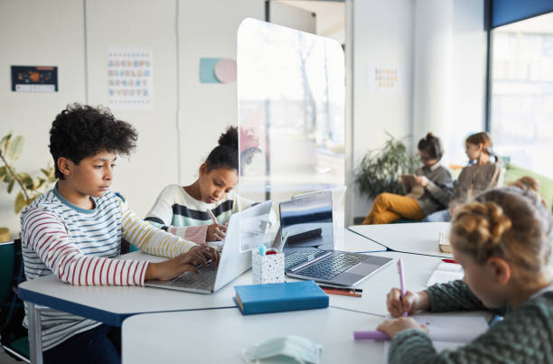 istock Children Studying at Covid Times 1322369836