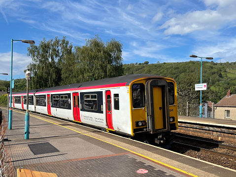 Treforest, Wales - June 2021: Train from Cardiff to the South Wales valleys leaving Treforest railway station