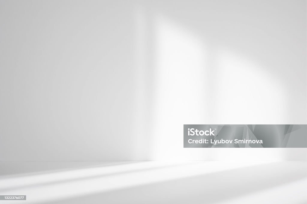 Abstract white studio background for product presentation. Empty room with shadows of window. Display product with blurred backdrop. Backgrounds Stock Photo