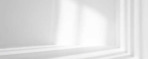 istock Empty white corner. Abstract studio background for product presentation. 3d room with shadows of window. Minimalistic space concept with blurred backdrop. Banner 1322376581