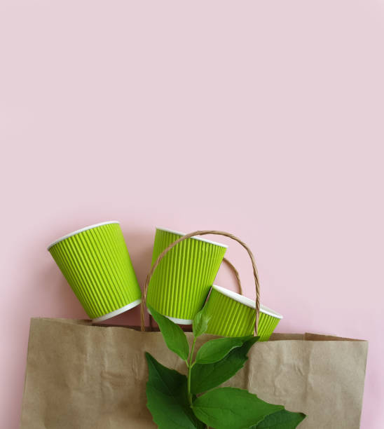 istock paper package, cup, green branch 1322381659