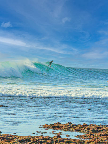 istock Image of a surfer on breaking wave on Indonesian island Bali 1322391972