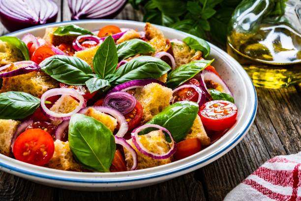 istock Classic panzanella salad on wooden board 1322392202
