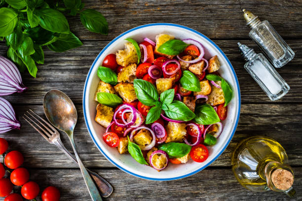 istock Classic panzanella salad on wooden board 1322392225