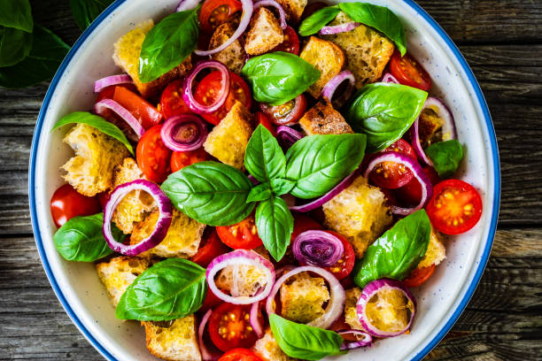 istock Classic panzanella salad on wooden board 1322392255