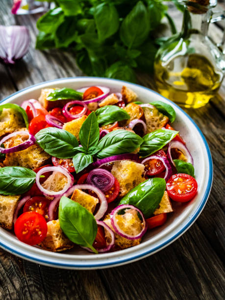 istock Classic panzanella salad on wooden board 1322392273