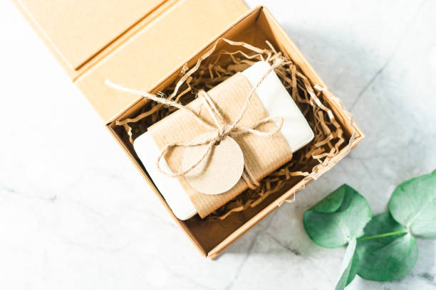 istock Natural soap in gift box with empty mockup tag 1322394350