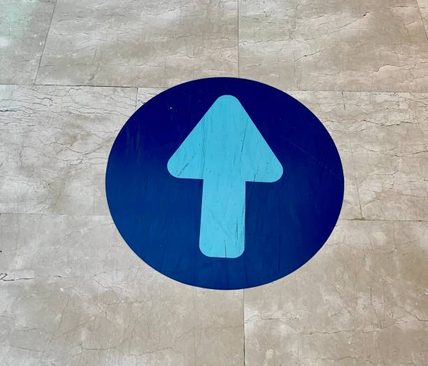 istock Directional arrow on the floor 1322394986