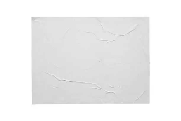 Photo of Blank white crumpled and creased paper sticker poster texture isolated on white background
