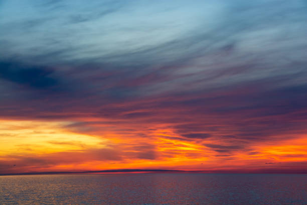 istock Beautiful dusk sea and orange sky 1322415789