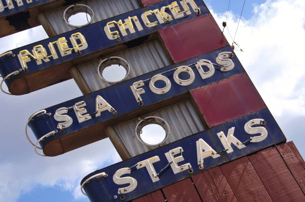 istock Restaurant Sign Outdoors On Building Roof With Blue Sky 1322416592