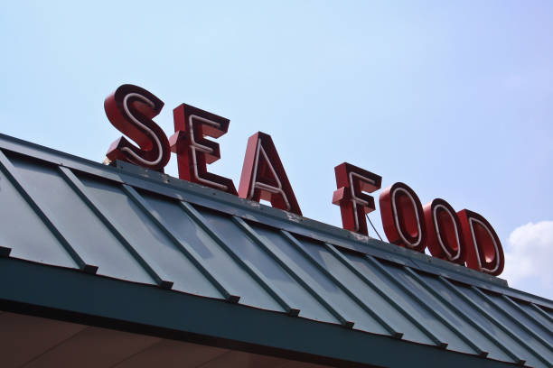 istock Restaurant Sign Outdoors On Building Roof With Blue Sky 1322416632