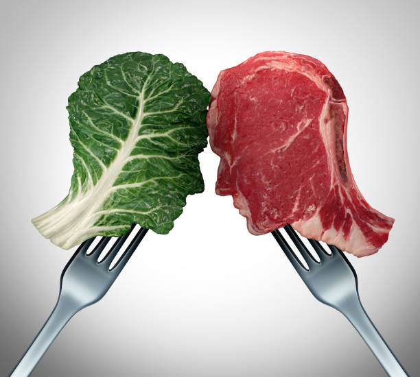 Food Choices Food choices and health related eating options as a human head shaped green vegetable kale leaf and meat as a red steak for nutritional decisions and diet or dieting dilemma with 3D render elements. carnivorous stock pictures, royalty-free photos & images