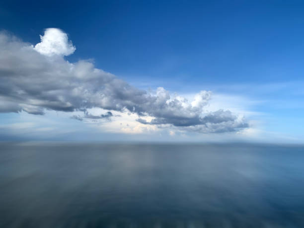 istock Blue tropical beach landscape with smooth wave water background. 1322432171