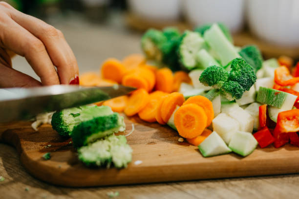 istock Cutting broccoli, zucchini and carrots 1322433899