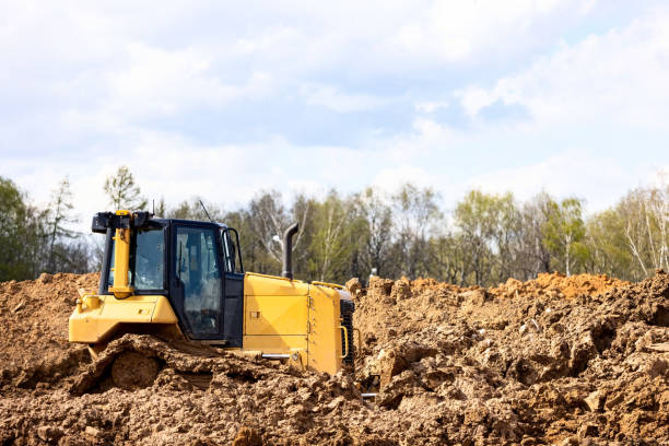 istock Bulldozer is moving dirt on the construction site 1322433976