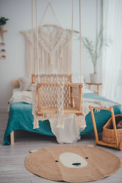 istock wooden hanging swing 1322436150