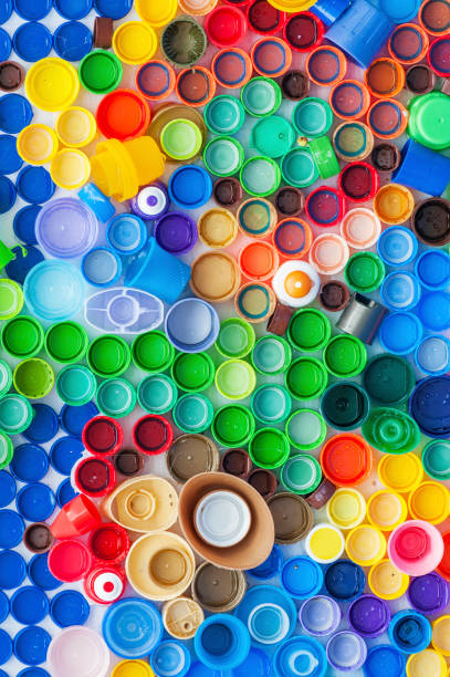 istock Recycled Plastic Bottle Caps. Colorful abstract background 1322436425