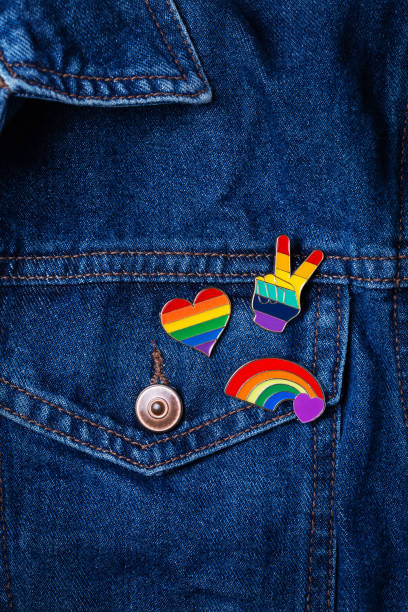 istock Rainbow lgbtq flag badges against denim background, pride month 1322436955