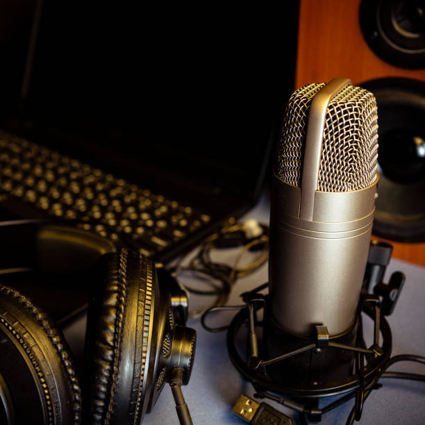 istock Studio microphone, headphones, speakers and computer. Home studio recording for sound mixing, sound design and music production. 1322438885