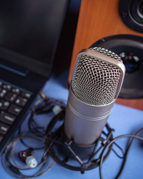 istock Studio microphone, headphones, speakers and computer. Home studio recording for sound mixing, sound design and music production. 1322438937