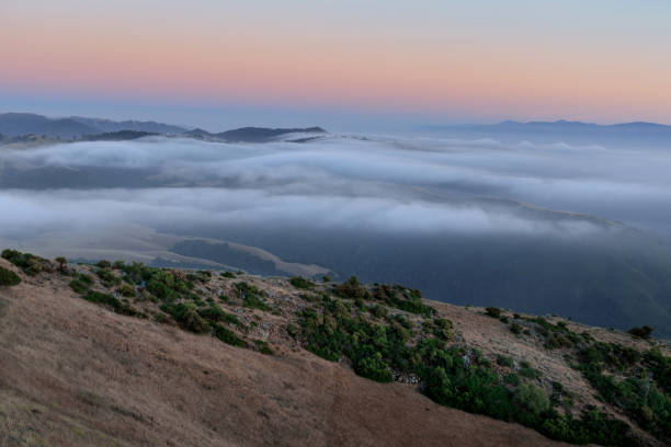istock Fog rolling over Salinas Valley via Fremont Peak State Park 1322446336