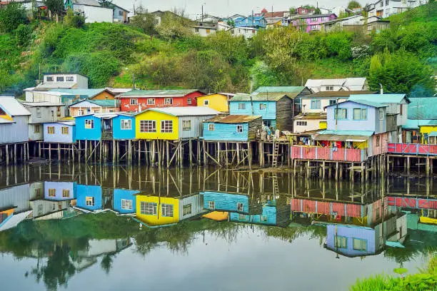 View of Colorful houses on stilts at the water edge, in Castro, Chiloe Island. Chile