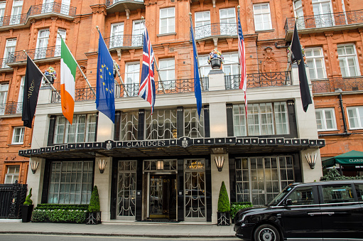 London, UK - April 21, 2021: Entrance to the famous five star Claridge's Hotel in the centre of Mayfair, London.